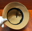 Prada Logo Plaque Straw Bucket Hat In Tan