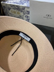 Chanel White Logo Embossed On Black Band Bucket Hat In Beige