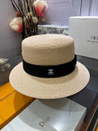 Chanel White Logo Embossed On Black Band Bucket Hat In Beige