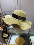 Chanel Black Band With Pearl Brim Wavy Straw Bucket Hat In Beige