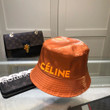 Celine Embossed Logo Plastic Bucket Hat In Orange