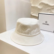 Chanel Logo Pearl Embellished Bucket Hat In White