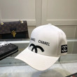 Chanel Half Of Cc Logo Embroidered Baseball Cap In White And Black