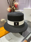 Chanel White Logo Embossed On Black Band Bucket Hat In Black