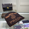 Prada Milano Letter And Logo Wool Beanie In Brown