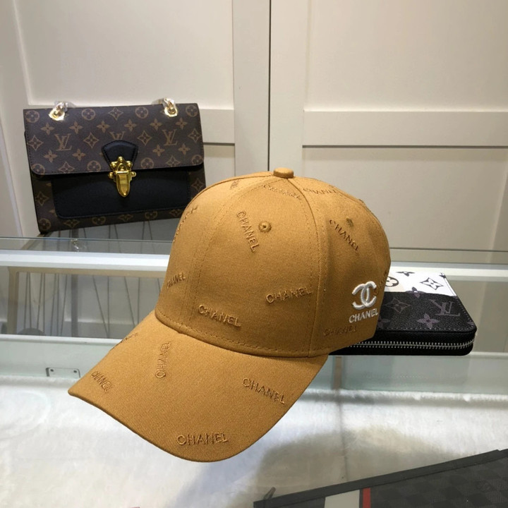 Chanel Logo Embroidered Baseball Cap In Yellow