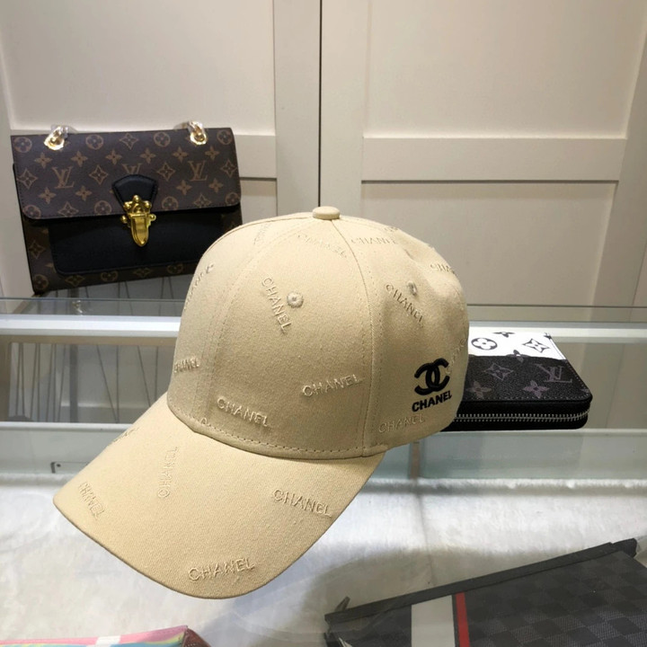 Chanel Logo Embroidered Baseball Cap In Beige