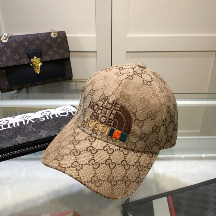 Gucci X The North Face Logo Embroidered Baseball Cap In Beige