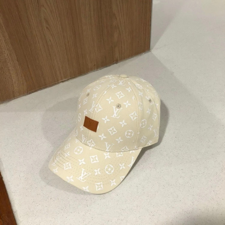 Louis Vuitton Lv Embossed Leather Patch Baseball Cap In Beige