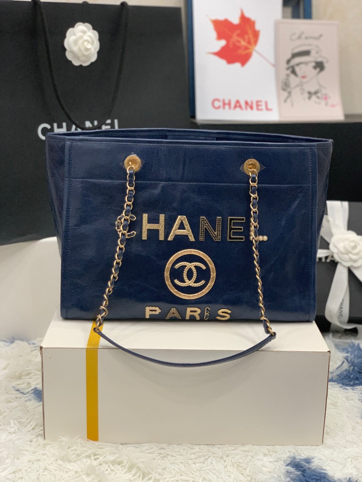 Chanel Logo Charms Deauville Bag Oil Wax Leather In Navy