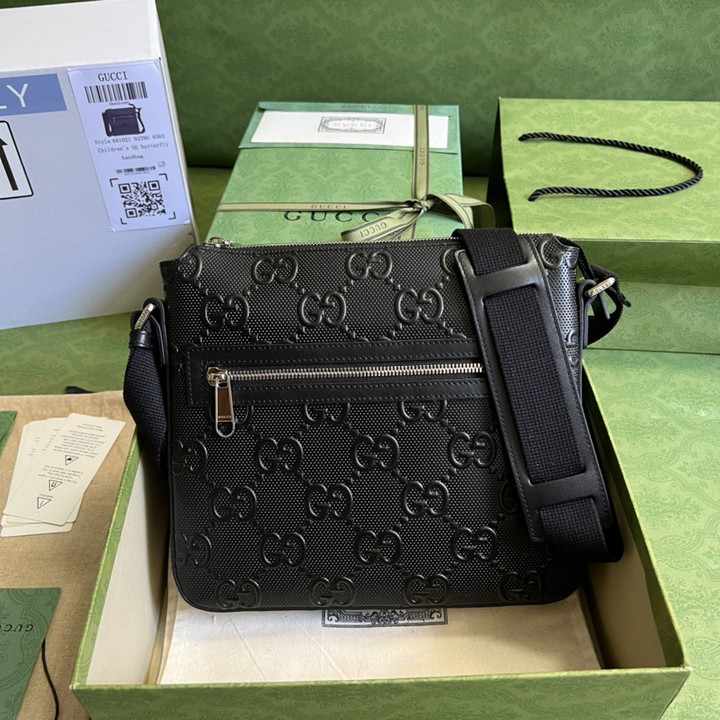 Gucci GG Embossed Small Messenger Bag In Black