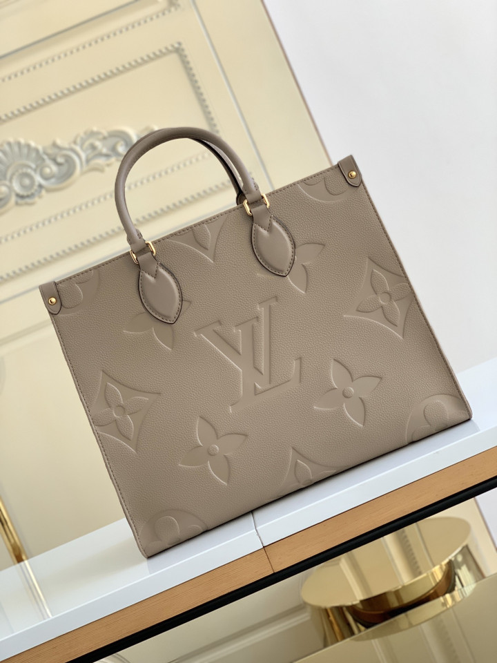 Louis Vuitton Onthego MM Tote Bag Embossed Monogram Empreinte In Beige