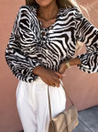 Zebra Belted Long Sleeve Blouse