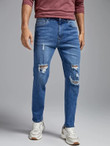 Men Ripped Frayed Bleach Wash Tapered Jeans