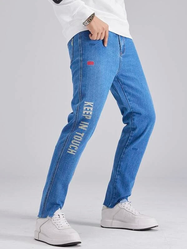 Men Letter Graphic Asymmetrical Raw Hem Jeans
