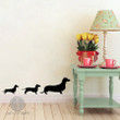 Transform your space with our adorable Dachshund Family Wall Decals, affectionately known as Weiner Dog Stickers. These charming decals feature a delightful pack of Dachshunds, adding a touch of canine charm to your walls. Easy to apply and remove, these stickers are a fun and versatile way to decorate your home, whether it's in your living room, bedroom, or a child's play area.  Create a heartwarming atmosphere and showcase your love for these endearing dogs. These wall decals are perfect for dog enthusiasts and make for a unique and engaging addition to any room. Embrace the cuteness of Dachshunds with our Weiner Dog Stickers and bring a smile to your walls today.