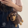 Surprise your friends with a delightful and unique gift! Our "Cute Simulation Dachshund Dog Plush Doll Crossbody Bag" is the perfect present for dog lovers. This adorable and functional bag combines the charm of a plush dachshund dog with a crossbody design, making it both a fashion statement and a practical accessory. Whether it's a birthday or any special occasion, this bag is sure to bring smiles and joy to your friends. Crafted with attention to detail and quality, it's a one-of-a-kind gift that's as cute as it is functional. Get this cute Dachshund Dog Plush Doll Crossbody Bag today and make your friend's day extra special!