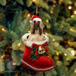 Add a touch of charm to your holiday decor with our Santa Boot Afghan Hound Dog Christmas Acrylic Ornament. This delightful ornament features an adorable Afghan Hound wearing Santa's boots, making it a perfect addition to your Christmas tree. Get in the festive spirit with this unique and eye-catching ornament.
