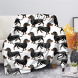 Introducing our Dachshund Fleece Flannel Dog Print Blanket – the perfect blend of warmth, style, and humor. This delightful blanket showcases an adorable Dachshund-themed design, making it a fun and charming addition to any home. Crafted from high-quality fleece flannel, it provides unmatched softness and warmth, ensuring cozy moments during chilly nights. Available in King and Queen sizes, this blanket offers the perfect combination of fashion and comfort, making it an ideal choice for dog lovers and anyone seeking a unique and playful bedspread. Enjoy the warmth and personality this blanket brings to your space.