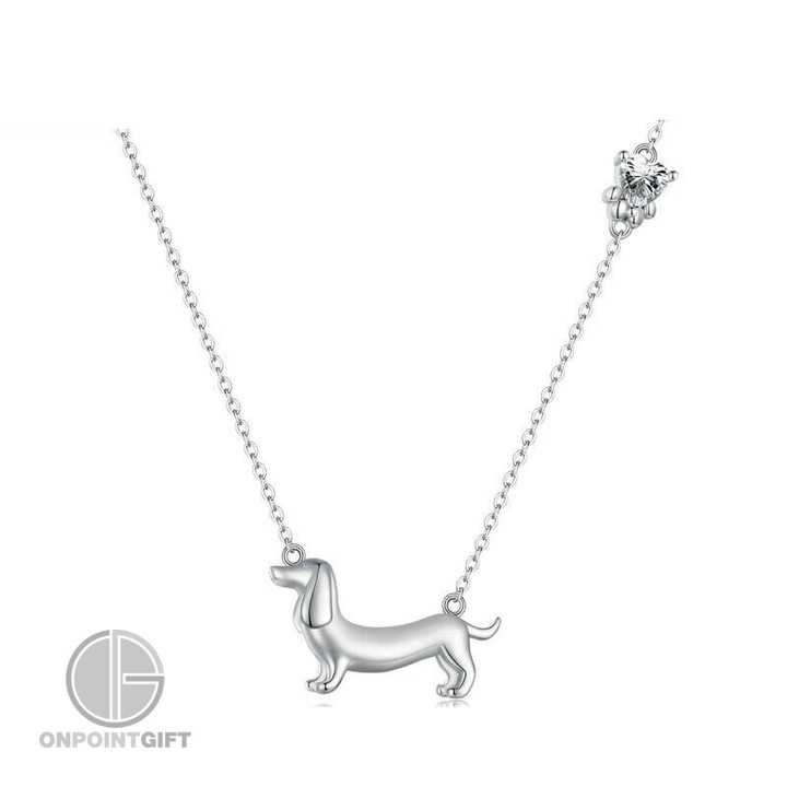 Elevate your style with our Sterling Silver Dachshund Pendant Necklace, a luxurious and unique Halloween gift. Crafted from high-quality 925 sterling silver, this exquisite piece of jewelry adds a touch of elegance to any outfit. The Dachshund dog pendant is a charming and whimsical accessory that's perfect for dog lovers. It also comes with free shipping, making it a convenient and thoughtful gift for any girl with a taste for luxury and a love for these adorable dogs. Make this Halloween special with a gift that's as special as she is.