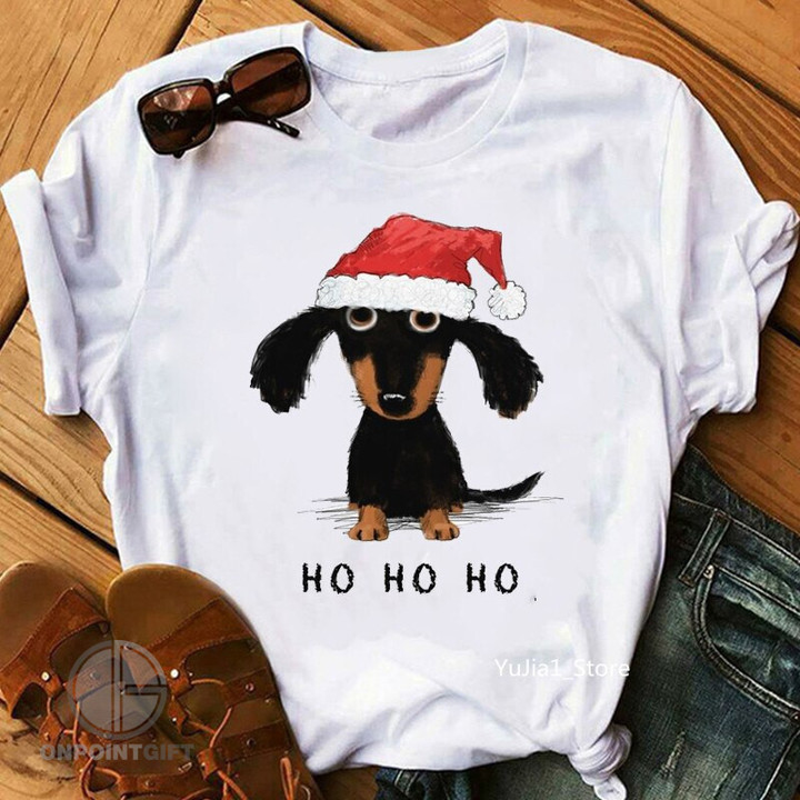 Elevate your summer style with these adorable Black and Tan Dachshund Love Print T-Shirts for Women. Crafted with care and creativity, these tees feature a charming cartoon of a Wiener Dog, making them the perfect choice for dog lovers and fashion enthusiasts alike.  Designed for both comfort and cuteness, these shirts are perfect for a day out, a casual gathering, or simply lounging at home. The high-quality fabric ensures a soft and cozy feel against your skin, and the love print adds a touch of charm and whimsy to your wardrobe.  Available in various sizes, these Dachshund-themed tees are a great addition to your summer collection. Whether you're a fan of Harajuku style or simply appreciate a touch of playfulness in your fashion, these shirts are an excellent choice. Don't miss the chance to showcase your affection for Dachshunds and flaunt your unique style with these Cute Wiener Dog Cartoon Tees.