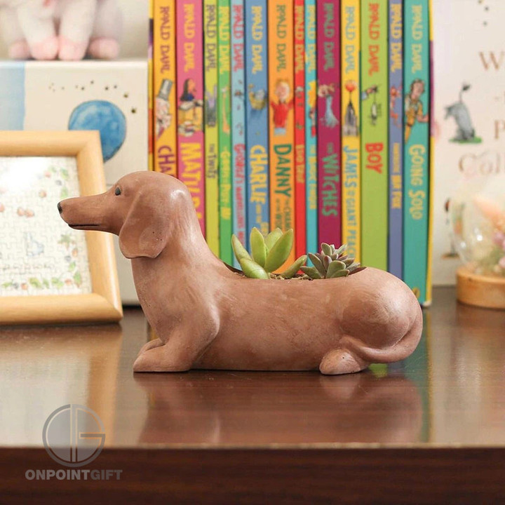 Elevate your gardening and decor projects with our new Concrete Dachshund Silicone Mold. This versatile mold allows you to craft charming mini succulent flower pots and decorative ornaments in the shape of an adorable Dachshund, perfect for adding a touch of whimsy to your space. Crafted with high-quality silicone, this mold is easy to use and clean, making it ideal for both beginners and experienced DIY enthusiasts. Create unique, concrete planters for your favorite succulents or craft delightful Dachshund-themed ornaments to adorn your garden, home, or office. With its intricate design and durable construction, this mold enables you to unleash your creativity and personalize your gardening and decor projects. Embrace the charm of Dachshunds and add a touch of uniqueness to your space with this Concrete Dachshund Silicone Mold. Get yours today and start crafting your own customized garden decor.