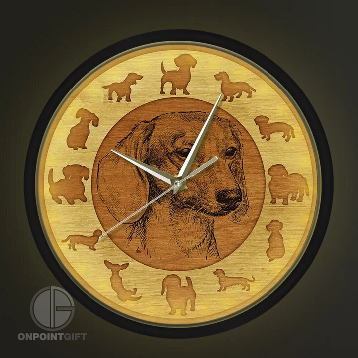 Enhance your living space with our Dachshund Dog Art Metal Frame Wall Clock. This unique timepiece combines artistic charm with functional elegance, making it an ideal addition to your living room or bedroom decor. Featuring a stylish Dachshund dog art design, this silent wall clock adds a touch of personality to your space. Crafted with quality materials, it's not only a stunning piece of home decor but also a reliable timekeeping device. Upgrade your interior with this distinctive and silent wall clock that complements your love for Dachshunds and adds a subtle, stylish accent to your home.