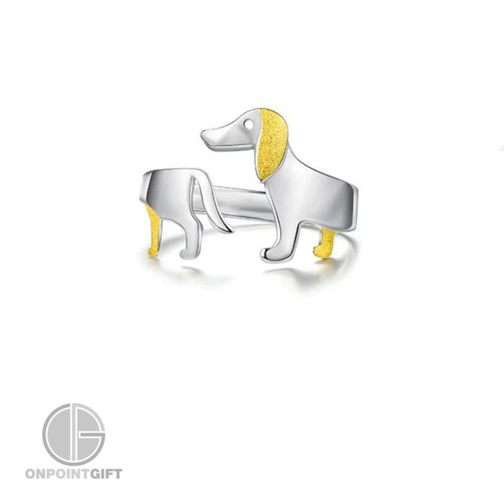 Elevate your style with our Sterling Silver Dachshund Adjustable Ring, a truly original and fashionable piece of jewelry. This charming ring features a Dachshund dog design that adds a unique and playful touch to your look. Made from high-quality sterling silver, it's not only a fashion statement but also a lasting keepsake. Perfect as a gift for a dog lover or as a treat for yourself, this ring is an excellent choice for any occasion. Its adjustable design ensures a comfortable fit for women, making it a versatile accessory for everyday wear or special events. Make a fashion statement and show your love for Dachshunds with this delightful ring.