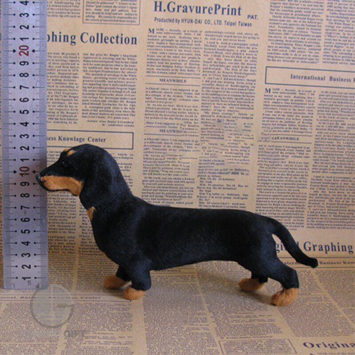 Indulge in the charm of our Dachshund Dog Plush Toy, meticulously designed to capture the essence of these lovable and playful canines. Crafted with exceptional attention to detail, our lifelike plush toy offers a strikingly realistic representation of a Dachshund, making it the perfect addition to any dog lover's collection.  With its soft and huggable materials, this plush Dachshund toy is not just a feast for the eyes but also a delight for the touch. Its quality construction ensures durability and longevity, making it suitable for both play and display.  Whether you're seeking a comforting cuddle companion or a decorative piece to add character to your space, our Dachshund Dog Plush Toy is the ideal choice. It's a wonderful gift for dog enthusiasts of all ages, bringing the joy of a Dachshund into your home without the responsibilities of pet ownership. Embrace the warmth and personality of these delightful dogs with our lifelike Dachshund Dog Plush Toy today.