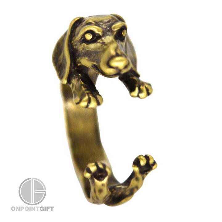 Enhance your style with our Black Realistic Dachshund Bronze Neck Dog Ring. This unique and detailed accessory adds a touch of canine charm to your look. Crafted with precision, it's a must-have for Dachshund lovers and fashion enthusiasts alike. Shop now for a distinctive piece that showcases your passion for these adorable dogs.