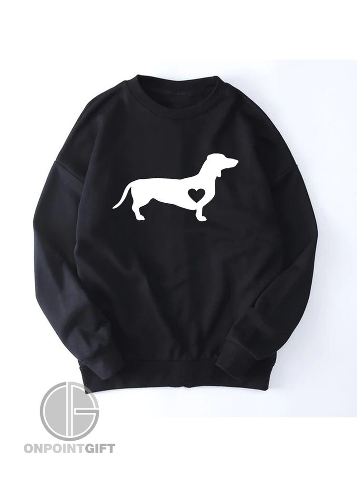 Elevate your casual style with our "Dachshund Love Sweatshirt." This adorable streetwear piece features a charming Wiener Dog design, perfect for dog lovers. Crafted for women with a love for cute and casual fashion, it's a must-have for your wardrobe. Embrace the Kawaii and Harajuku vibes while staying cozy and stylish in this unique graphic sweatshirt.