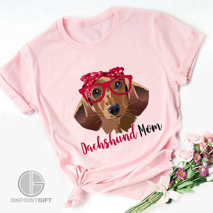 Elevate your style with our Pink Dachshund Mom T-Shirts - a must-have for women who adore dogs. These vintage-inspired tees blend fashion and furry affection seamlessly. Get yours today and wear your love for Dachshunds proudly!