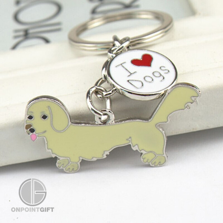 Our Dachshund Dog Pendant Keychains are the perfect accessory for pet lovers. Whether you're a dachshund enthusiast or simply adore dogs, these keychains are a delightful way to express your love for these charming canines.  Designed for both women and men, these keychains are versatile and make for an excellent gift for couples or any dog-loving individuals. Each keychain features an adorable dachshund dog pendant that adds a touch of personality to your belongings.  Use them as bag charms or attach them to your car keys – these keychains are as practical as they are cute. They're a great way to keep your keys organized while showcasing your passion for dogs.  If you're looking for a thoughtful gift for a pet-loving couple, these Dachshund Dog Pendant Keychains are an excellent choice. They symbolize love, loyalty, and the joy that pets bring to our lives. Show your affection for dachshunds and dogs with these charming keychains and carry a piece of your passion wherever you go.