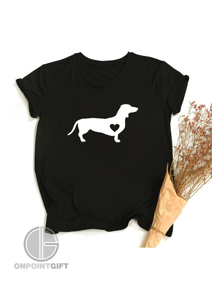 Elevate your casual style with our Dachshund Dog Print Women's T-Shirt. Embrace the dog mom life in this stylish and comfortable graphic tee. Perfect for any occasion, this shirt offers a unique blend of fashion and comfort, making it an ideal addition to your wardrobe. Whether you're strolling the streets, embracing the Tumblr vibes, or seeking an aesthetic edge, this tee has you covered. Upgrade your wardrobe with our Harajuku-inspired tops, and let your love for dachshunds shine through in style.