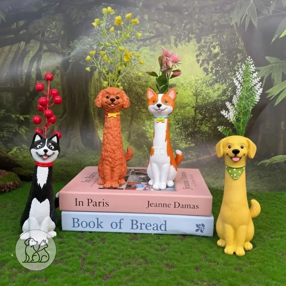 A collection of handcrafted, cartoon-style elongated resin dog vases shaped like a Golden Retriever, Poodle, Husky, and Corgi holding decorative plants on a desk.