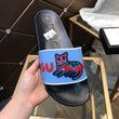 Gucci Cute Cats Embossed Slides In Light Blue And Black