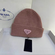 Prada Triangle Logo Wool Beanie In Grey/Dusty Pink