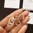 Christian Dior White CD Resin Pearl Stud Earrings