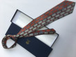 Versace Greca And Brick Pattern Necktie Caravatta In Orange