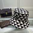 Prada Triangle Pattern Bucket Hat In Black/White