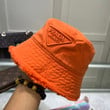 Prada Drill Bucket Hat With Fringed Edges In Orange