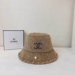 Chanel Faux Fur Bucket Hat In Brown