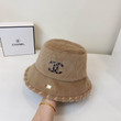 Chanel Faux Fur Bucket Hat In Brown