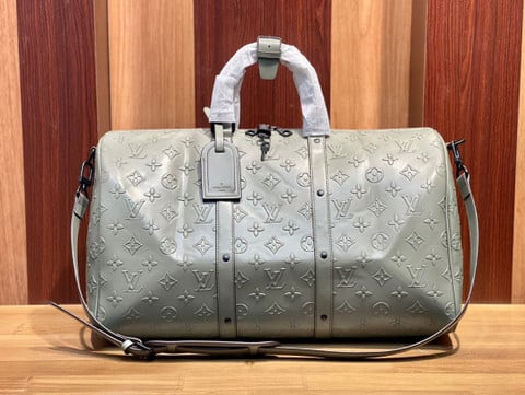 Louis Vuitton Keepall Bandoulière 50 Bag Monogram Embossed Leather In -  Praise To Heaven