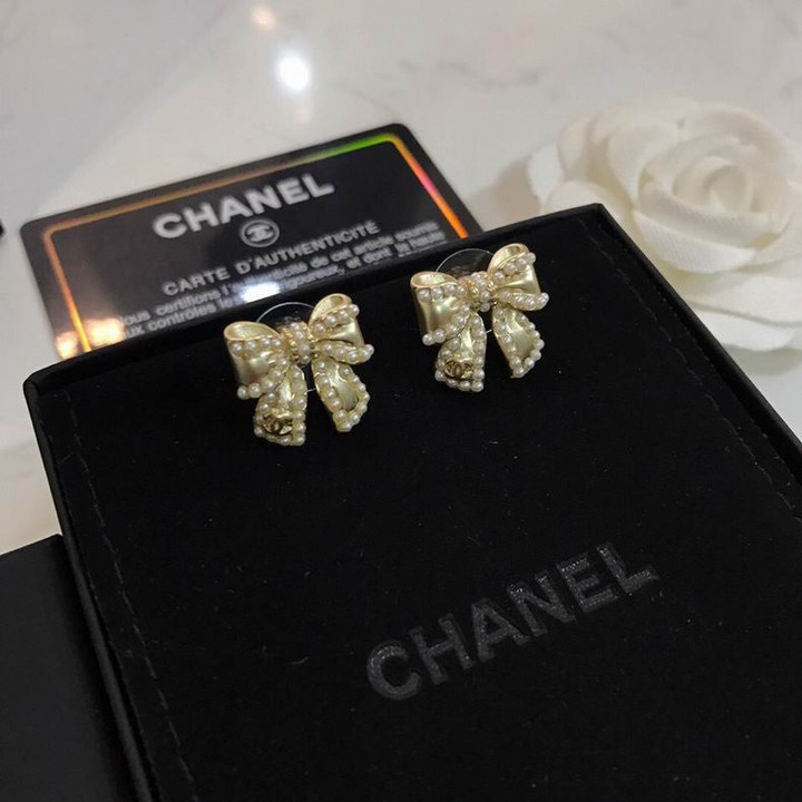 Chanel Pearls Shiny Gold Metal Bow Earrings
