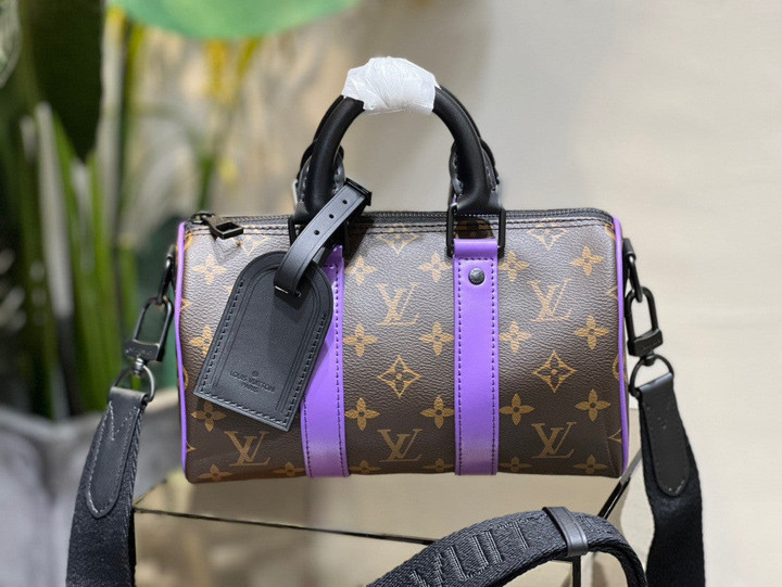 Louis Vuitton Keepall Bandoulière 25 Bag Monogram Canvas Leather In Brown And Purple