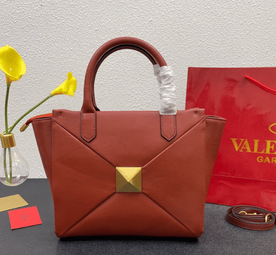 Valentino Garavani Medium One Stud Nappa Handbag In Gingerbread