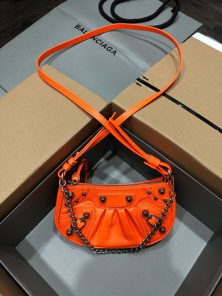 Balenciaga Le Cagole Mini Chain Bag Leather In Orange