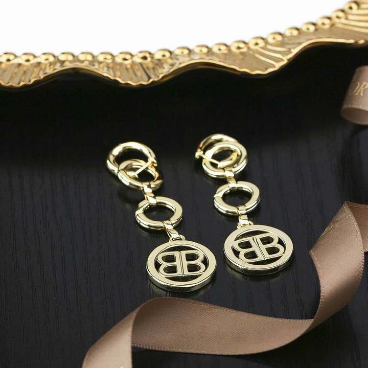 Balenciaga BB Logo Time Earrings In Yellow Gold