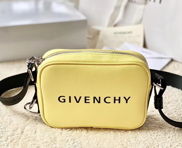 Givenchy Logo-Print Messenger Bag Cowhide Leather In Yellow